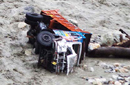 17 feared drowned as truck falls into river